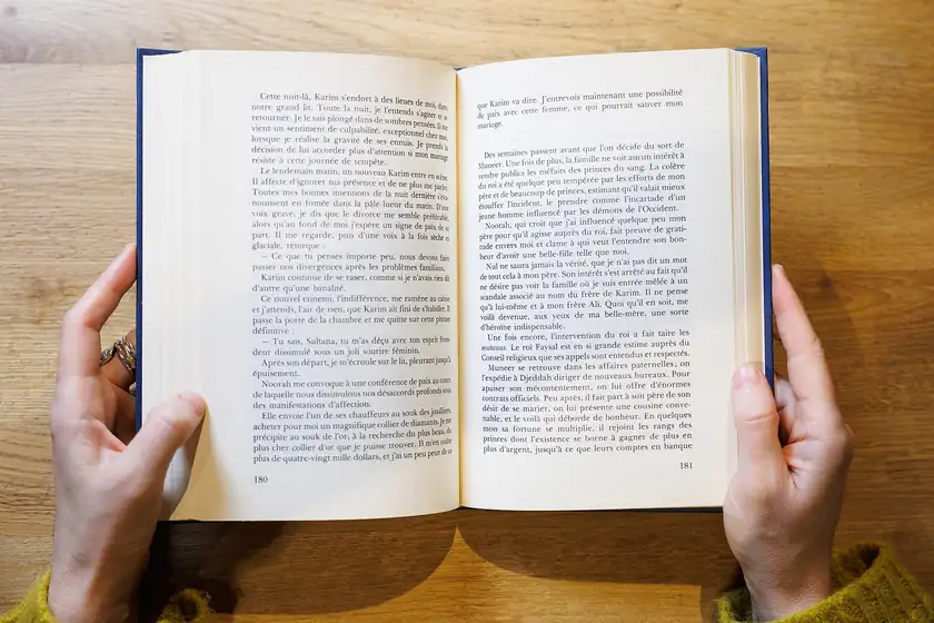 An open book lying flat, showing two pages of printed text