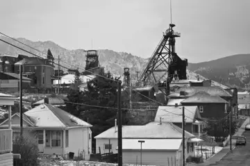 Historic brick buildings climbing a steep street in uptown Butte, Montana