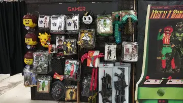 Packaged Halloween costumes hanging on a store rack